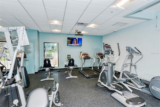 gym featuring a drop ceiling