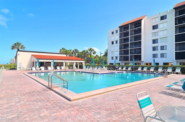 view of swimming pool featuring a patio