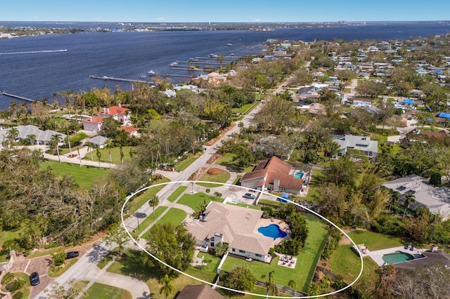 birds eye view of property featuring a water view