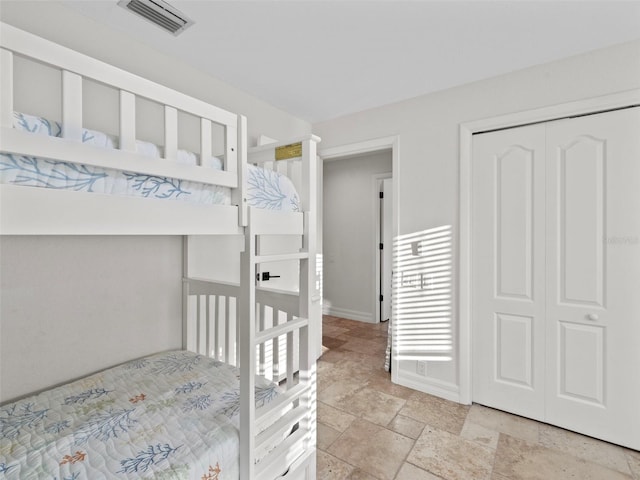 unfurnished bedroom with a closet