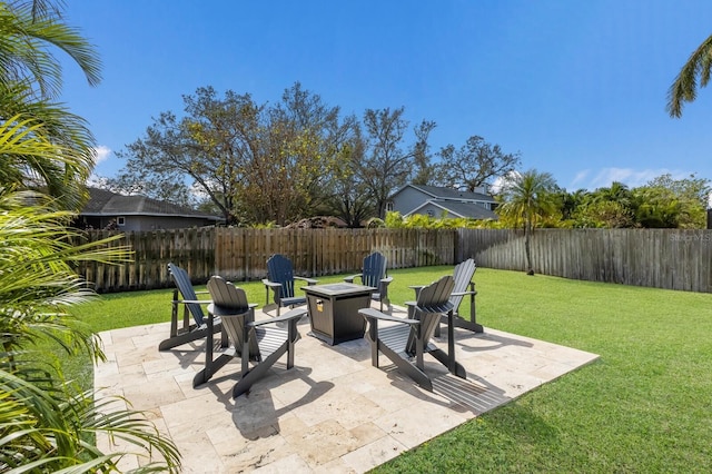 view of patio / terrace with a fire pit