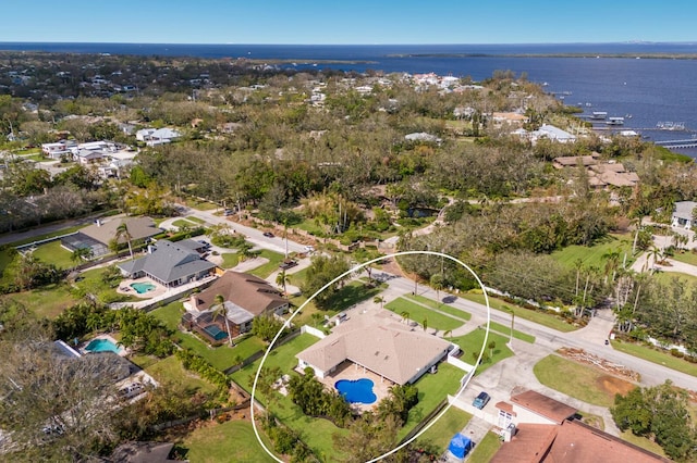 drone / aerial view with a water view