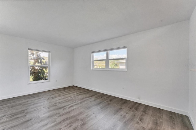 empty room featuring hardwood / wood-style floors