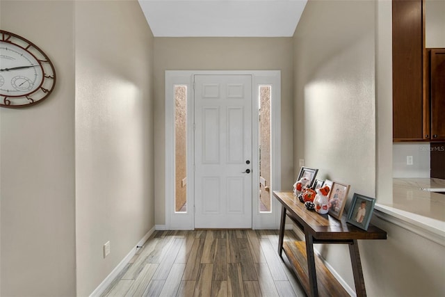 entrance foyer with light hardwood / wood-style floors