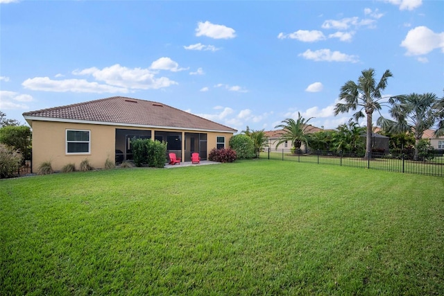 view of yard featuring a sunroom