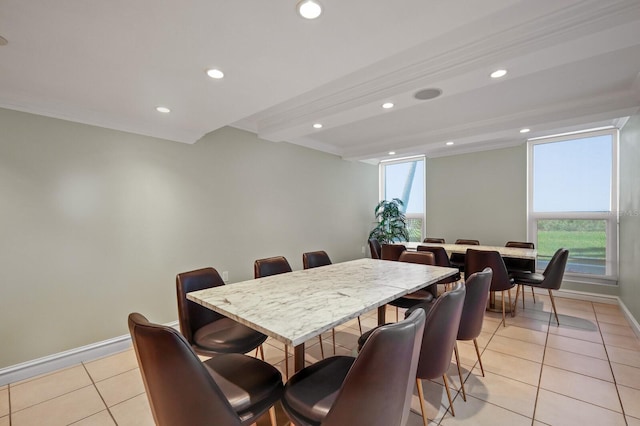 dining area with crown molding, beam ceiling, and light tile patterned floors