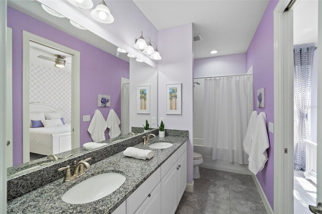 full bathroom featuring shower / bath combination with curtain, toilet, ceiling fan, vanity, and tile patterned flooring