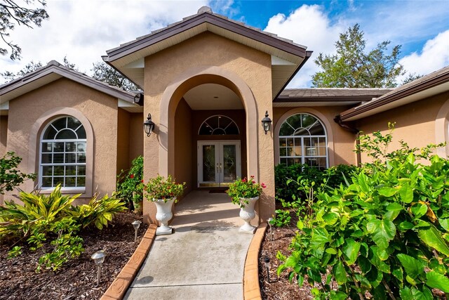 view of exterior entry with french doors