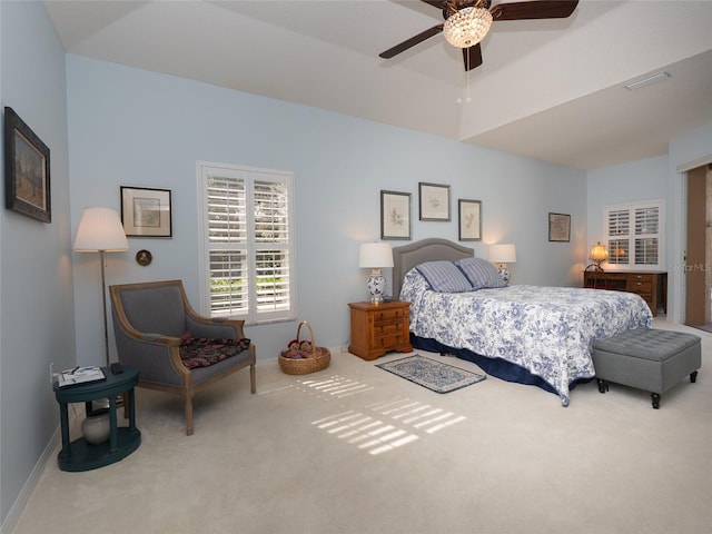 bedroom with ceiling fan and carpet floors