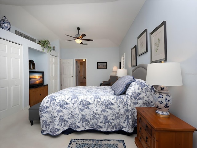 bedroom featuring ceiling fan and light colored carpet