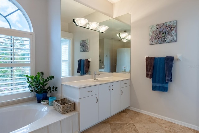 bathroom with a bathtub and vanity