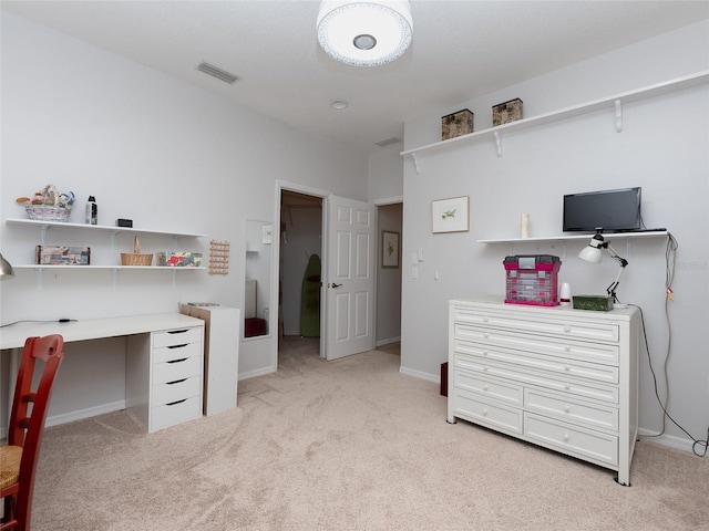 bedroom with light carpet