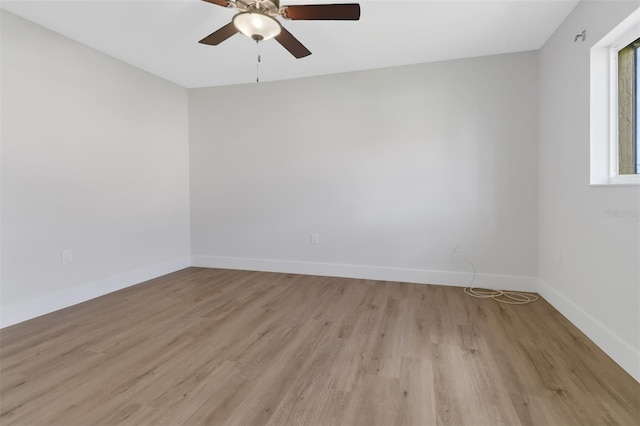 unfurnished room with light hardwood / wood-style floors and ceiling fan