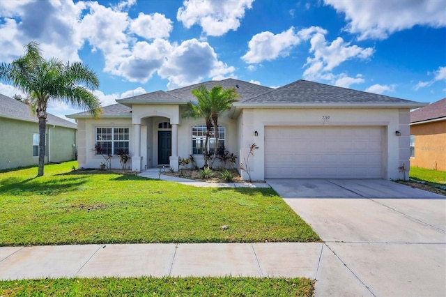 single story home featuring a front yard and a garage