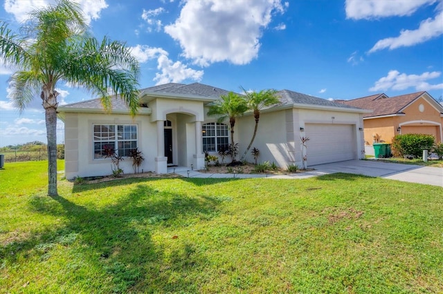 single story home featuring a front yard and a garage