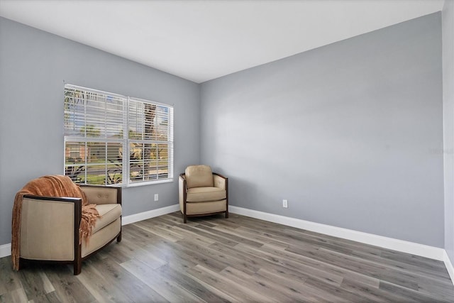 living area with wood-type flooring