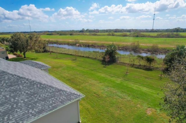 bird's eye view featuring a water view and a rural view