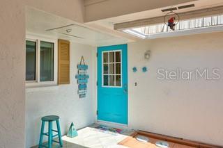 2609 Riverbluff Pkwy Unit 146, Sarasota, FL 34231 - entrance to property featuring stucco siding