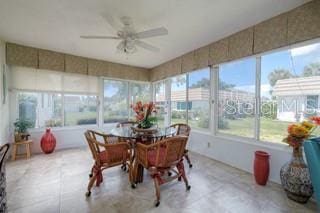 sunroom / solarium with ceiling fan