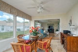 dining space with ceiling fan