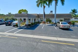 2609 Riverbluff Pkwy Unit 146, Sarasota, FL 34231 - view of uncovered parking lot