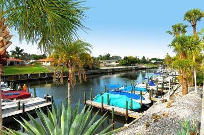 2609 Riverbluff Pkwy Unit 146, Sarasota, FL 34231 - dock with a water view