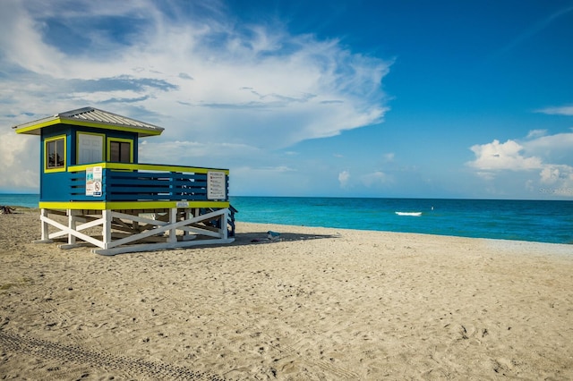 property view of water featuring a view of the beach