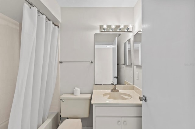 bathroom with vanity, toilet, and shower / bathtub combination with curtain