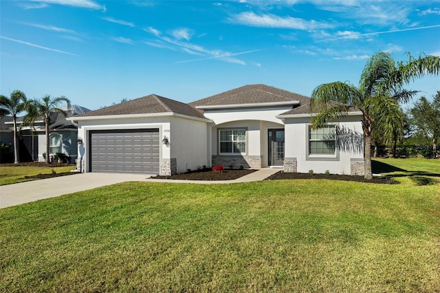 view of front of house featuring a front yard and a garage