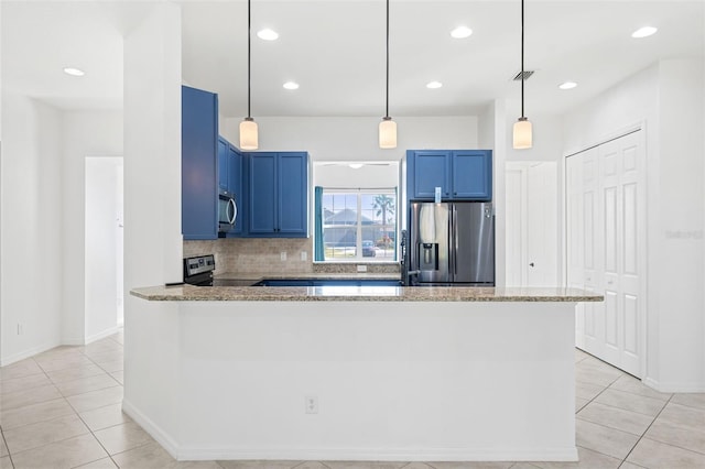 kitchen featuring blue cabinetry, light stone countertops, hanging light fixtures, stainless steel appliances, and backsplash