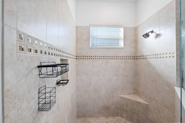 bathroom featuring tiled shower