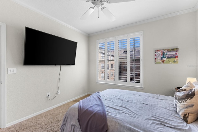 bedroom with carpet floors, ceiling fan, and ornamental molding