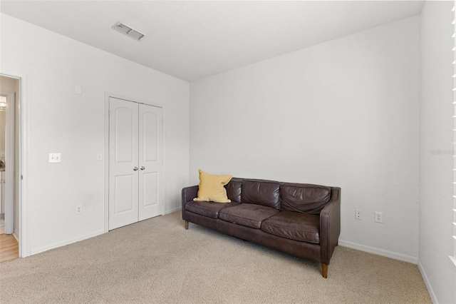 sitting room with light carpet