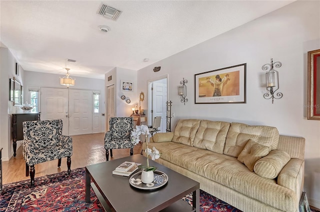 living room with hardwood / wood-style floors