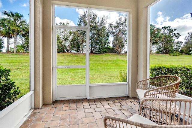 sunroom featuring a wealth of natural light