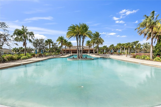 view of swimming pool with a patio