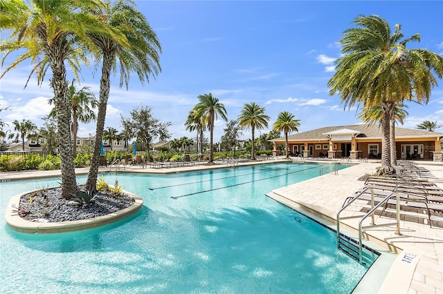 view of swimming pool featuring a patio area