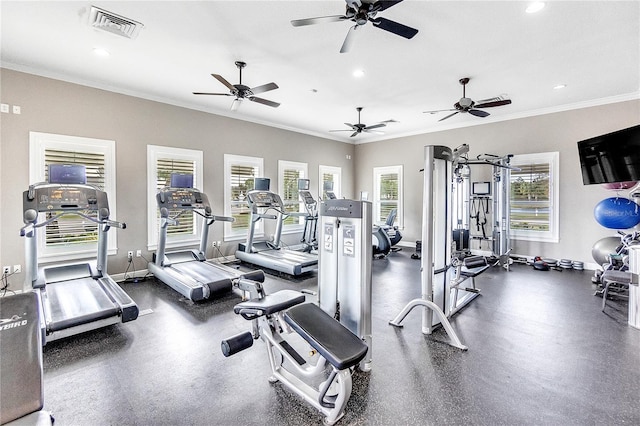 workout area featuring crown molding, a healthy amount of sunlight, and ceiling fan