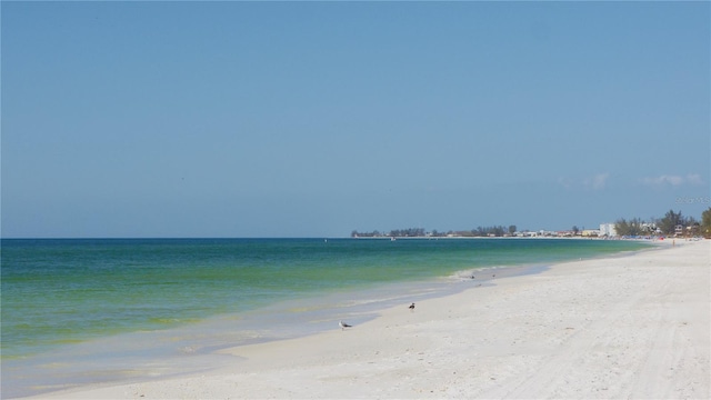 view of water feature with a beach view