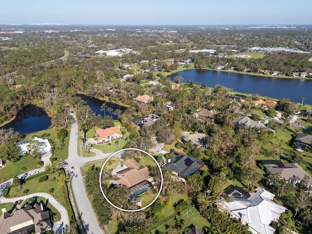 drone / aerial view with a water view