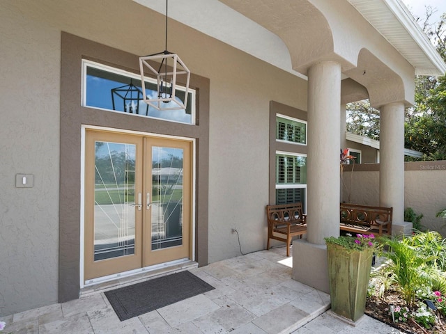 property entrance with a patio