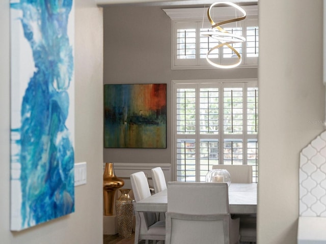 dining area with hardwood / wood-style flooring