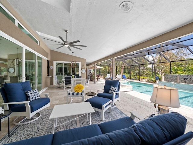 view of patio featuring ceiling fan, a lanai, and an outdoor hangout area