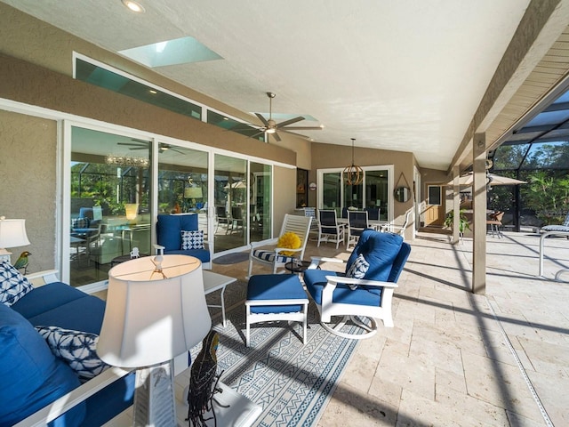 view of patio / terrace featuring ceiling fan and outdoor lounge area