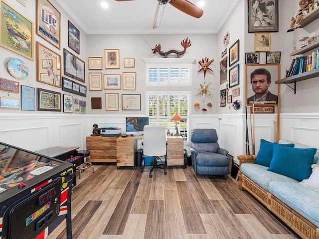 home office with ornamental molding, hardwood / wood-style floors, and ceiling fan