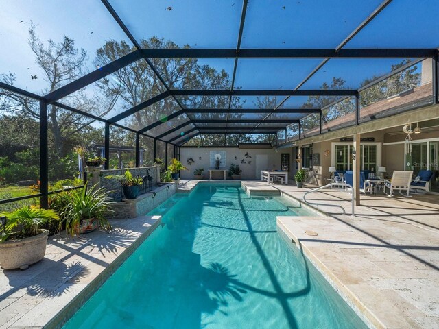 7317 Crape Myrtle Way, Sarasota, FL 34241 - outdoor pool with a patio area, glass enclosure, and ceiling fan