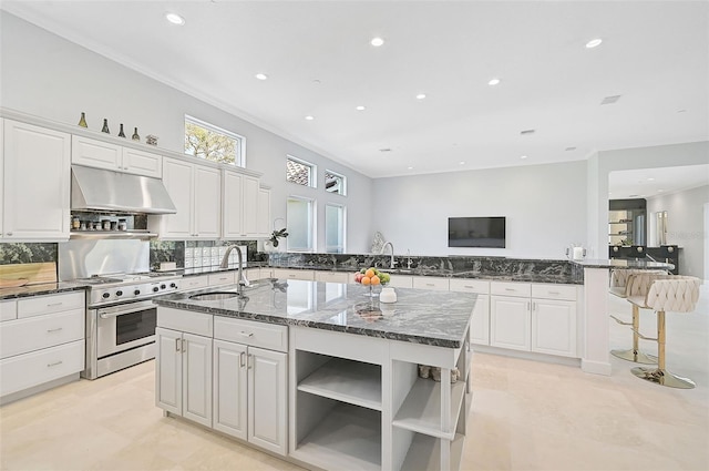 kitchen featuring white cabinetry and kitchen peninsula