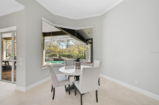 dining area with ornamental molding