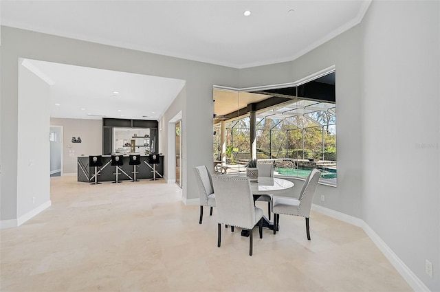 dining room with ornamental molding