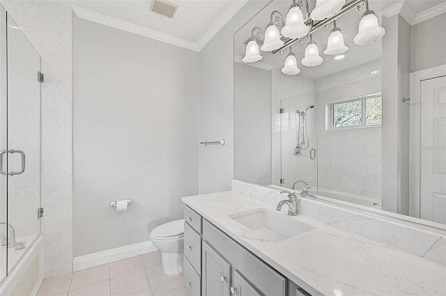 full bathroom with toilet, vanity, tile patterned floors, and crown molding